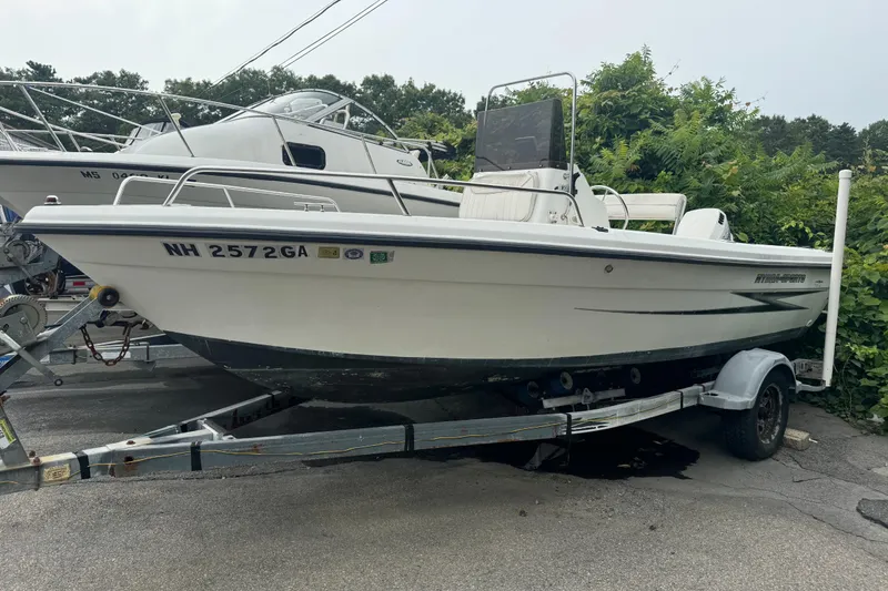 Slide: The Image of 2000 Hydra-Sports 180 Seahorse CC boat on trailer, parked outdoors. - 7