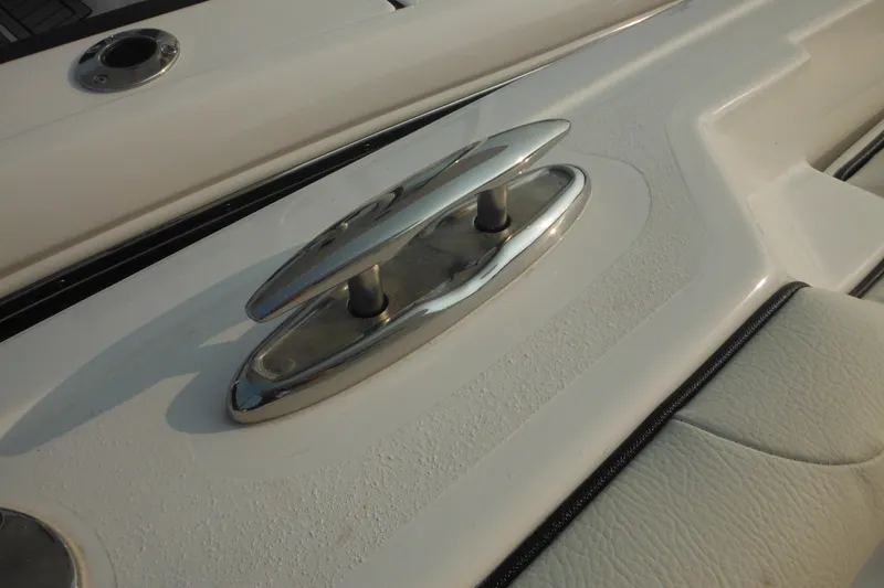 Slide: The Image of Stainless steel cleat on 2026 Tidewater 232 LXF boat deck. - 24