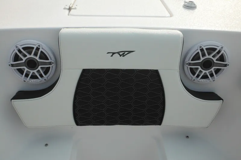 Slide: The Image of 2026 Tidewater 232 LXF boat interior with speakers and stylish seating. - 30