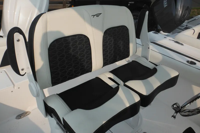 Slide: The Image of 2026 Tidewater 232 LXF boat seats with black and white upholstery. - 40