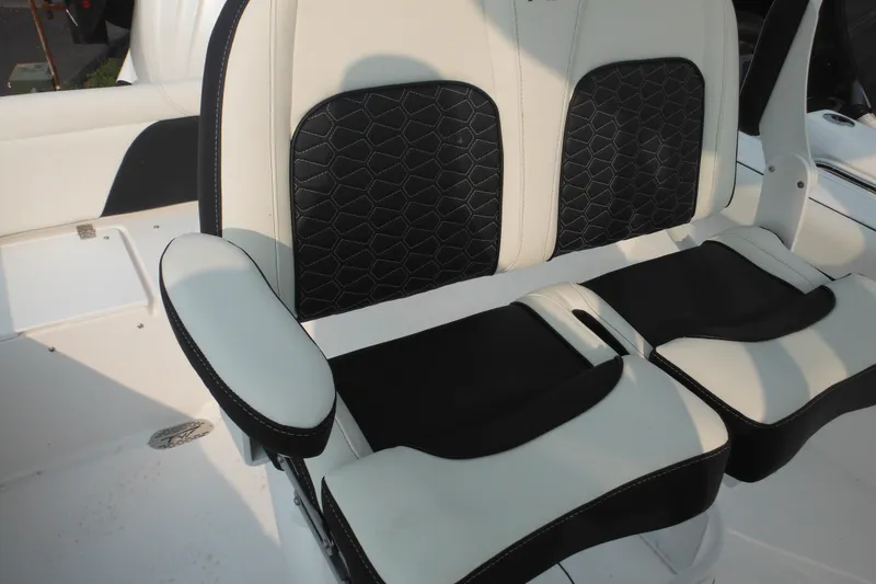 Slide: The Image of 2026 Tidewater 232 LXF boat seats with black and white upholstery. - 41