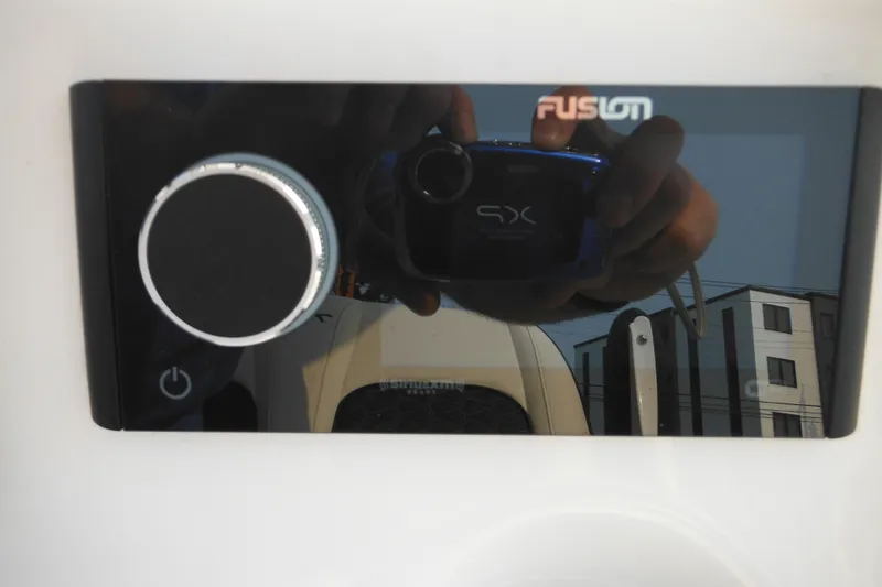 Slide: The Image of Close-up of Fusion audio system on 2026 Tidewater 232 LXF boat. - 47