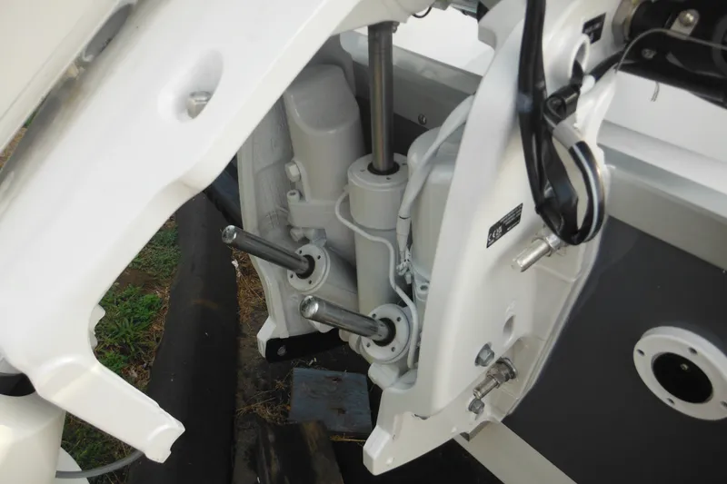 Slide: The Image of Close-up of 2026 Tidewater 232 LXF boat engine components and mounting details. - 5