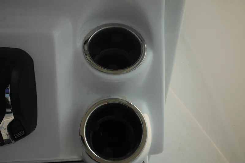 Slide: The Image of Cup holders on 2026 Tidewater 232 LXF boat console. - 52
