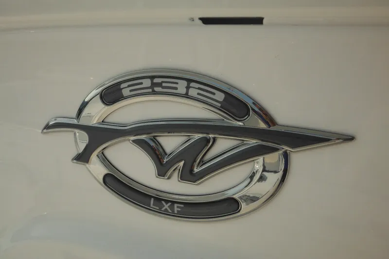 Slide: The Image of 2026 Tidewater 232 LXF logo emblem on boat exterior. - 60