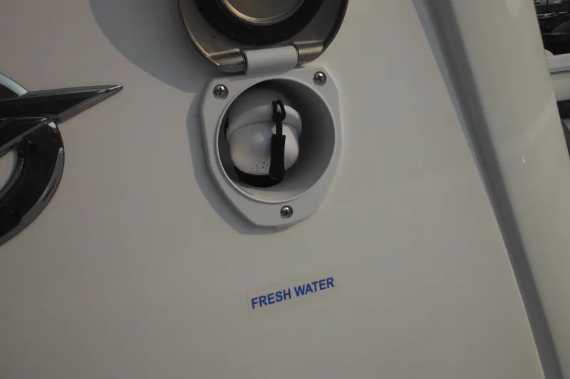 Slide: The Image of Fresh water inlet on 2026 Tidewater 232 LXF boat. - 63