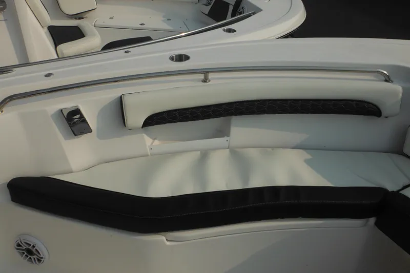 Slide: The Image of 2026 Tidewater 232 LXF boat interior with cushioned seating and sleek design. - 67