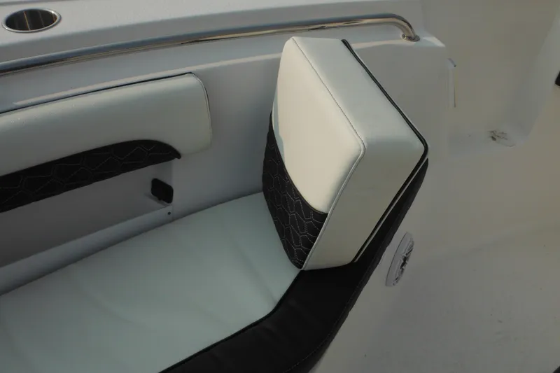 Slide: The Image of 2026 Tidewater 232 LXF boat seat with black and white upholstery. - 69