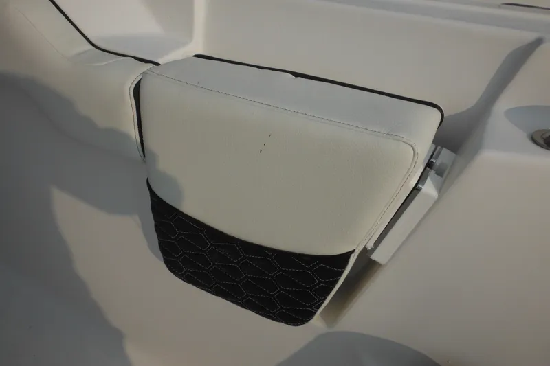 Slide: The Image of 2026 Tidewater 232 LXF boat seat with white and black upholstery. - 70