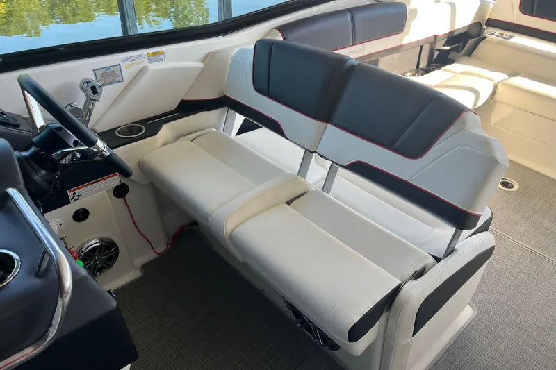 Slide: The Image of 2021 Formula 310 Bowrider I/O interior with sleek seating and modern dashboard design. - 15