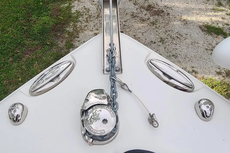 Slide: The Image of Bow of 2018 Sea Hunt Gamefish 25 with anchor chain and cleats. - 3