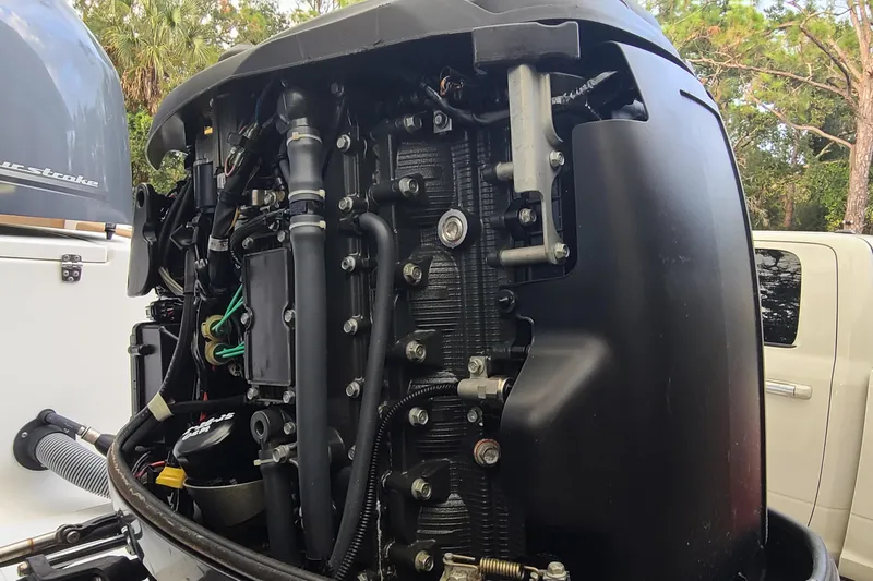 Slide: The Image of 2018 Sea Hunt Gamefish 25 outboard motor, detailed view of engine components. - 35