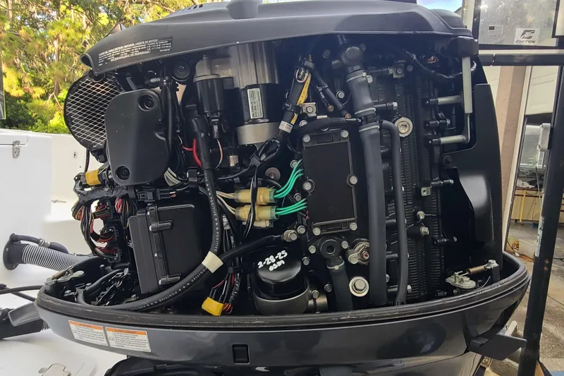 Slide: The Image of 2018 Sea Hunt Gamefish 25 outboard engine, detailed internal components view. - 38
