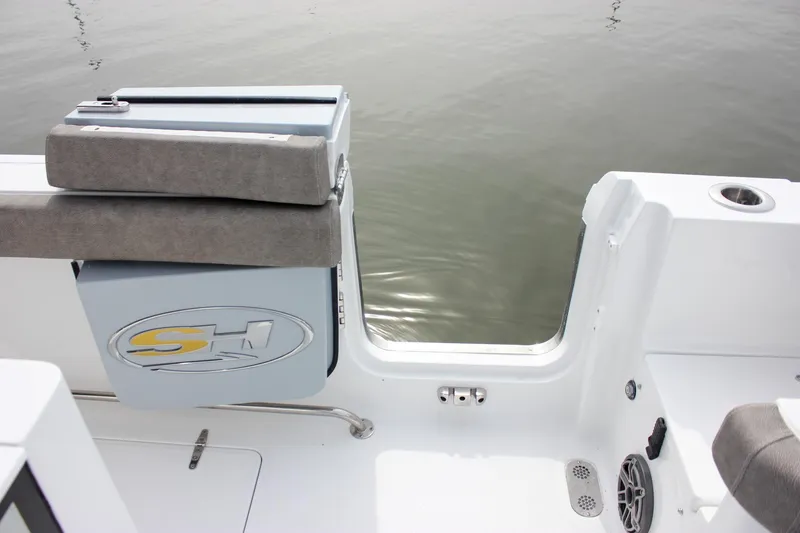 Slide: The Image of 2026 Sea Hunt Gamefish 28 boat with forward seating, featuring sleek design and water access. - 26