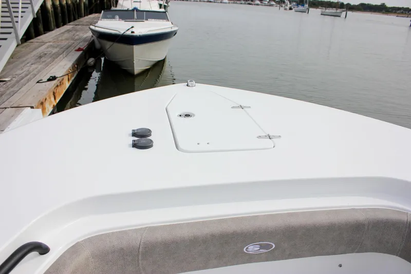 Slide: The Image of 2026 Sea Hunt Gamefish 28 Forward Seating boat docked at marina. - 35