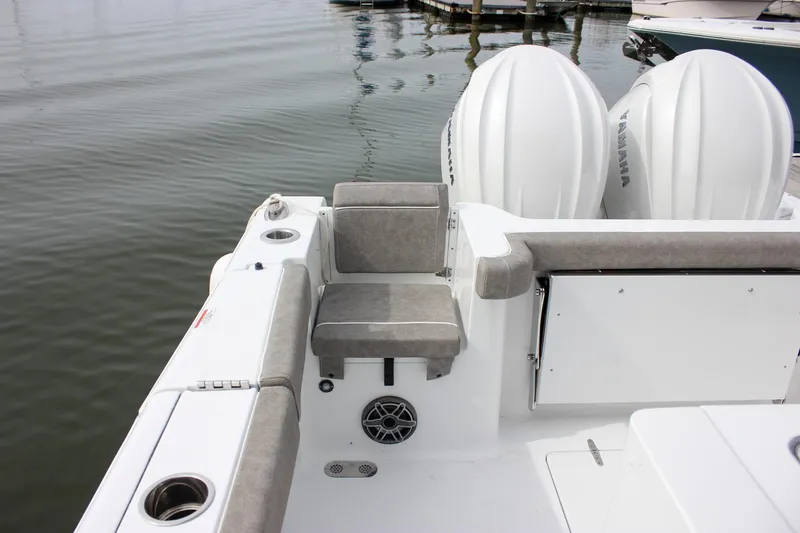 Slide: The Image of 2026 Sea Hunt Gamefish 28 boat with forward seating and twin Yamaha engines. - 37