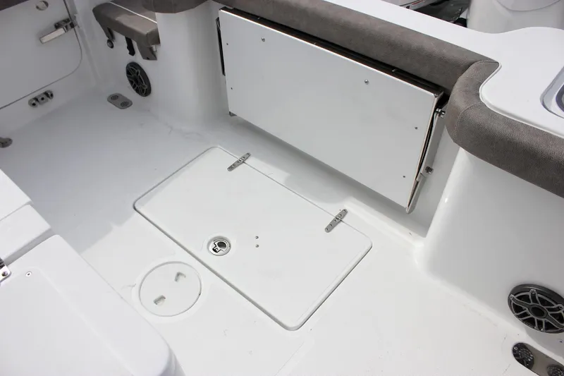 Slide: The Image of 2026 Sea Hunt Gamefish 28 boat interior with storage compartments and seating. - 39