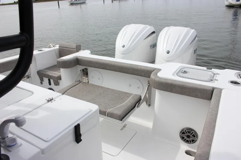 Slide: The Image of 2026 Sea Hunt Gamefish 28 boat with dual Yamaha engines and spacious seating. - 41
