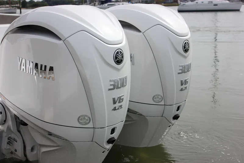 Slide: The Image of Twin Yamaha 300 V6 outboard engines on a 2026 Sea Hunt Gamefish 28 boat. - 72