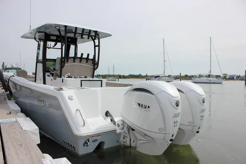 Slide: The Image of 2026 Sea Hunt Gamefish 28 with Yamaha engines docked at marina. - 73