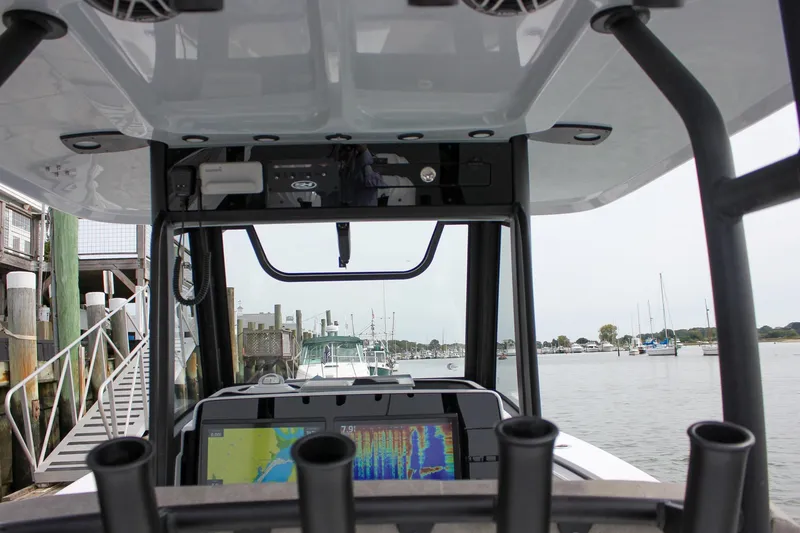 Slide: The Image of Interior view of 2026 Sea Hunt Gamefish 28 boat with navigation equipment. - 76