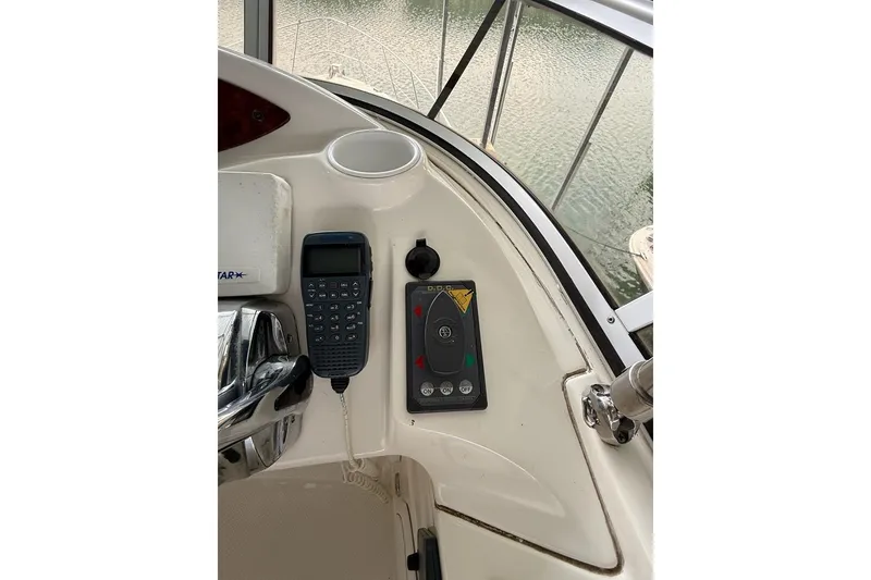 Slide: The Image of Control panel of a 2008 Meridian 391 boat with navigation equipment. - 13