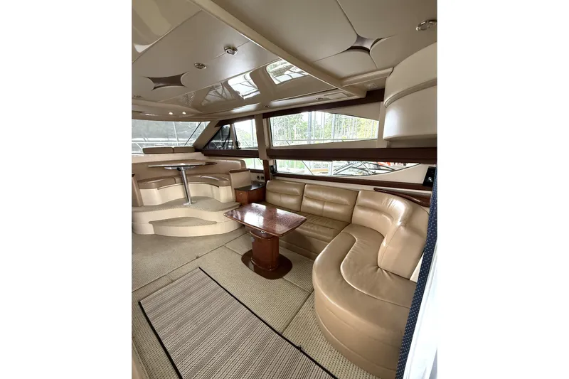 Slide: The Image of Luxurious interior of 2008 Meridian 391 yacht with leather seating and elegant design. - 19