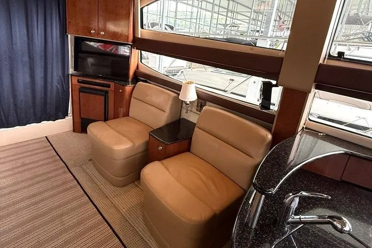 Slide: The Image of Luxurious interior of 2008 Meridian 391 yacht with plush seating and modern amenities. - 22