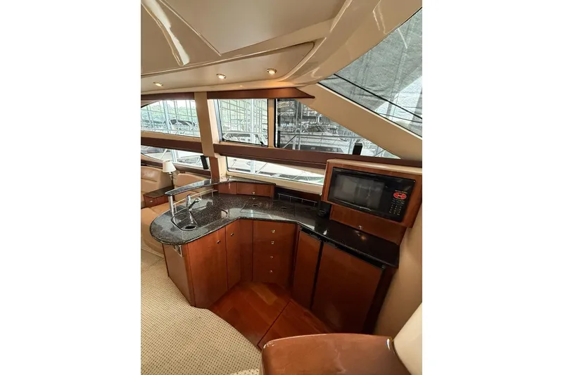 Slide: The Image of Luxurious 2008 Meridian 391 yacht interior with modern kitchen amenities. - 23