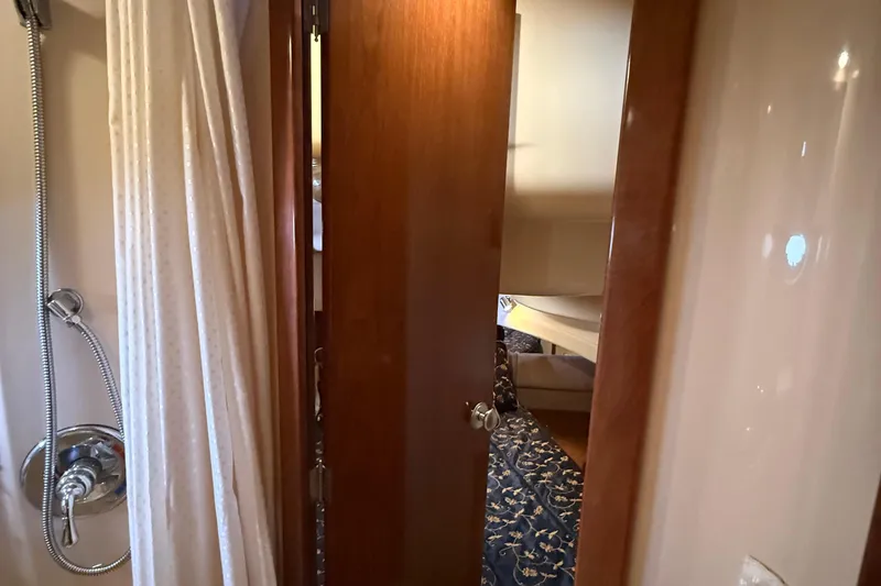 Slide: The Image of 2008 Meridian 391 yacht interior with shower and cozy cabin view. - 32