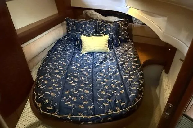 Slide: The Image of Luxurious cabin interior of 2008 Meridian 391 yacht with floral bedding. - 34