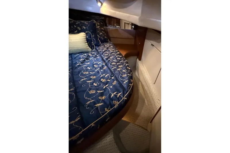 Slide: The Image of Luxurious cabin interior of 2008 Meridian 391 yacht with elegant bedding. - 36