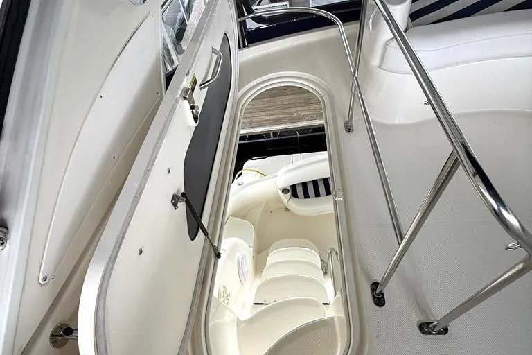 Slide: The Image of 2008 Meridian 391 yacht interior with open hatch and seating area. - 37