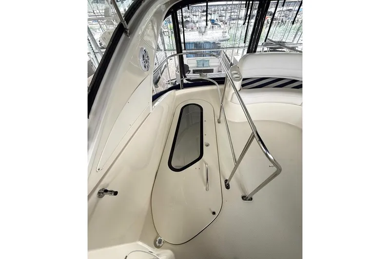 Slide: The Image of 2008 Meridian 391 yacht interior with sleek design and stainless steel railings. - 38