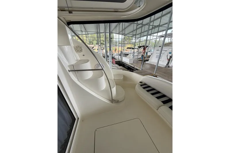 Slide: The Image of Interior view of a 2008 Meridian 391 yacht with seating and spiral staircase. - 40
