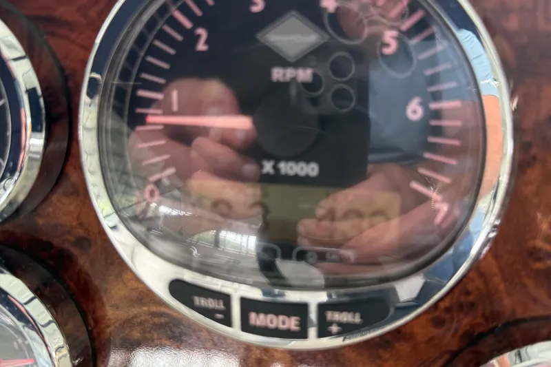 Slide: The Image of Close-up of a 2008 Meridian 391 RPM gauge with reflections on the glass. - 45