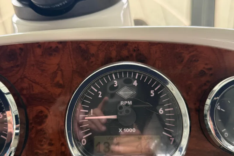 Slide: The Image of Close-up of 2008 Meridian 391 RPM gauge on a wooden dashboard. - 46