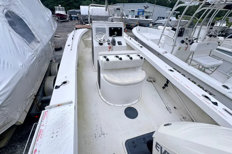 Slide: The Image of 2017 May-Craft 20 Cape Classic boat interior with steering console and seating. - 6