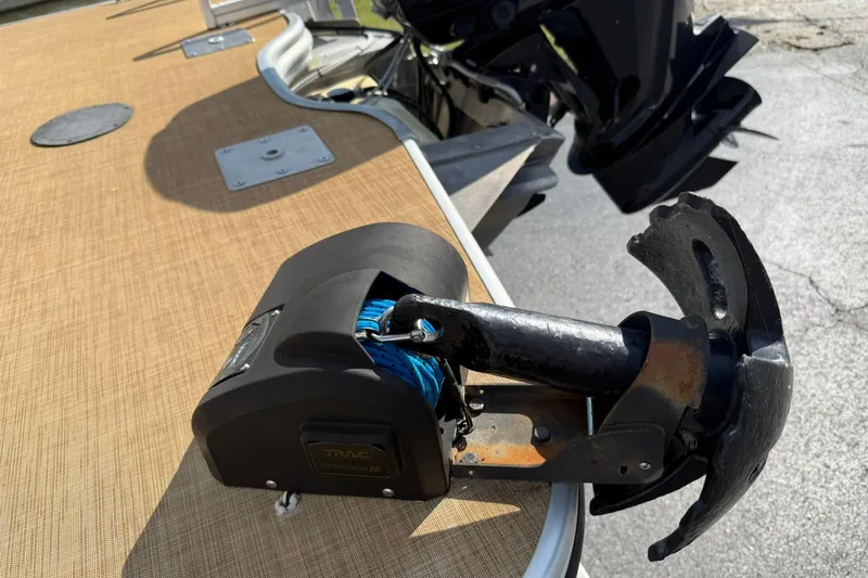 Slide: The Image of Anchor winch on 2015 Lowe SS 230 pontoon boat deck. - 4