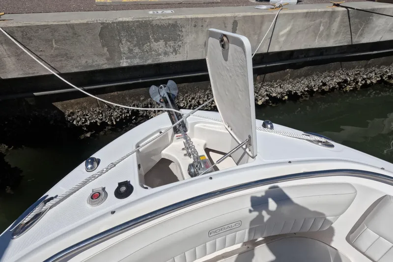 Slide: The Image of Anchor chain mechanism on a 2012 Robalo R247 Dual Console boat. - 102