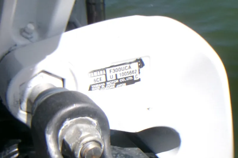 Slide: The Image of Yamaha motor label on 2012 Robalo R247 Dual Console boat. - 47