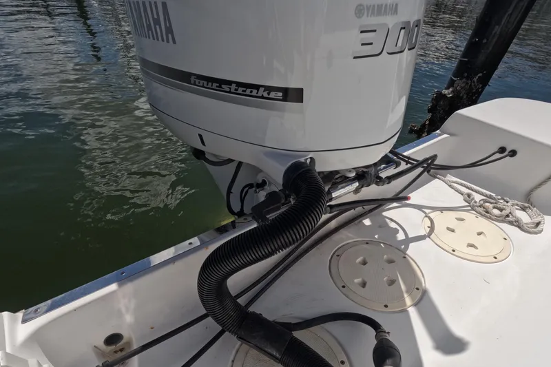 Slide: The Image of 2012 Robalo R247 Dual Console with Yamaha 300 outboard engine. - 69