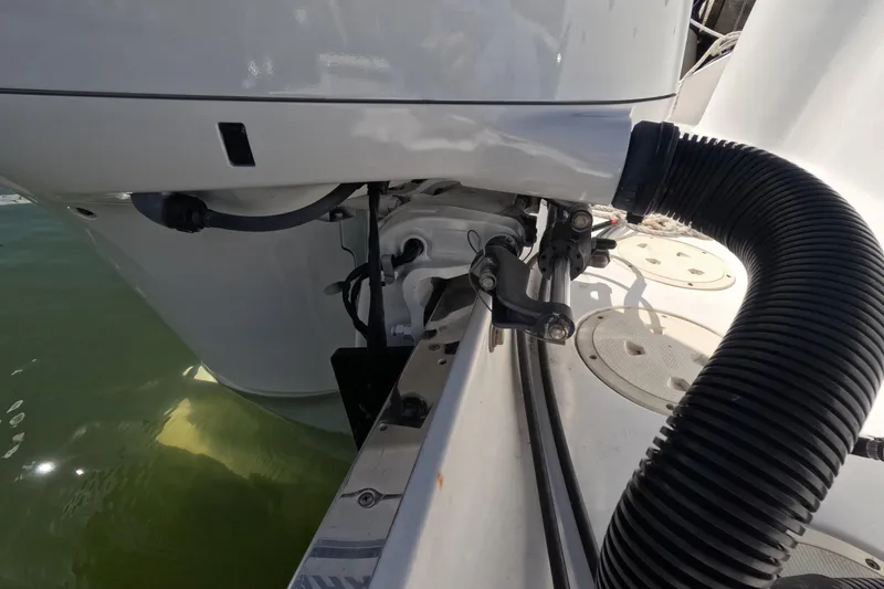 Slide: The Image of 2012 Robalo R247 Dual Console boat engine and transom detail. - 72