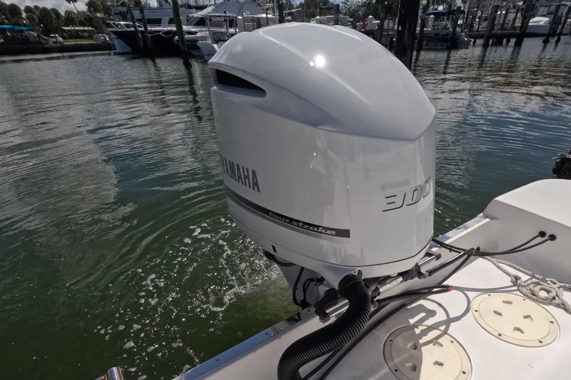 Slide: The Image of Yamaha display on 2012 Robalo R247 Dual Console showing trip and fuel data. - 92