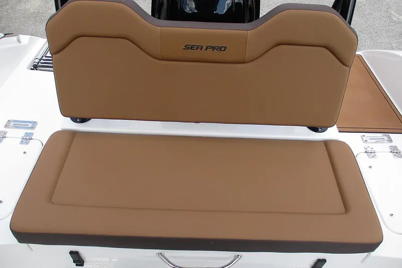 Slide: The Image of 2026 Sea Pro 225FLX Sandbar boat seating with brown cushions and sleek design. - 15