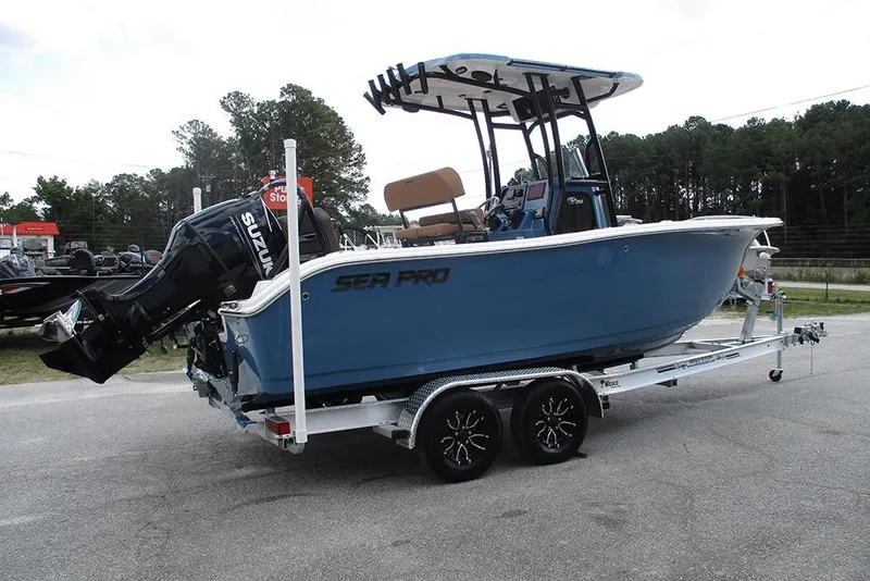 Slide: The Image of 2026 Sea Pro 225FLX Sandbar boat on trailer, featuring Suzuki outboard motor. - 6
