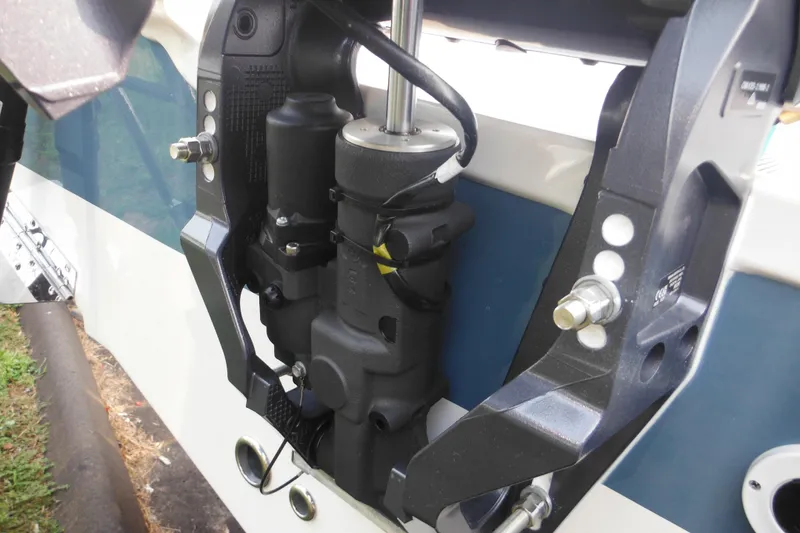 Slide: The Image of Close-up of 2026 Tidewater 210 LXF boat engine mount and hydraulic system. - 12