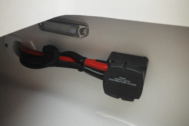 Slide: The Image of Electrical wiring and distribution studs in a 2026 Tidewater 210 LXF boat. - 25