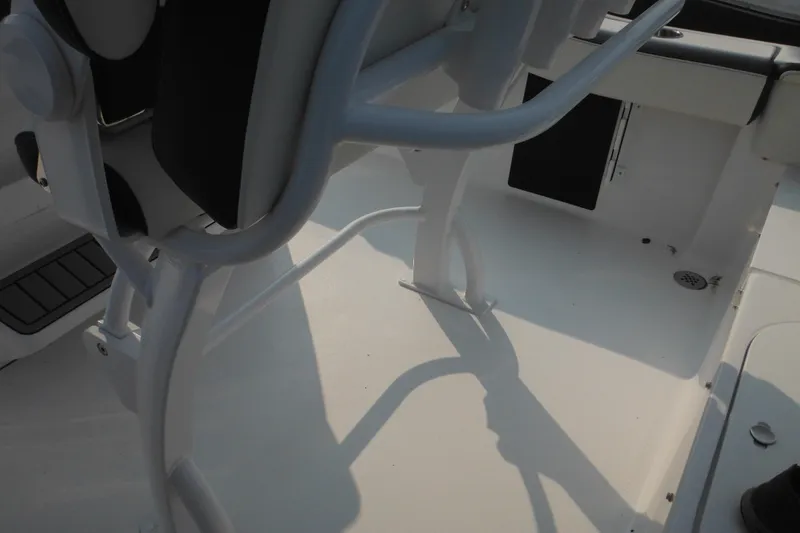 Slide: The Image of 2026 Tidewater 210 LXF boat interior with seating and deck details. - 37