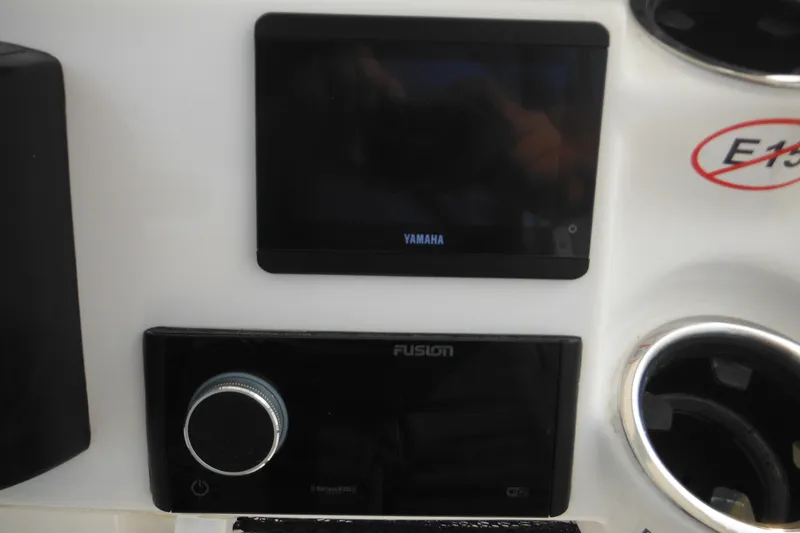 Slide: The Image of Dashboard of 2026 Tidewater 210 LXF with Yamaha and Fusion controls. - 39